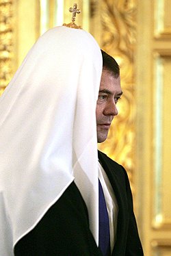 Президент и патриарх сходятся в оценке сотрудничества государства и церкви  Фото: AP. Загружается с сайта Ъ